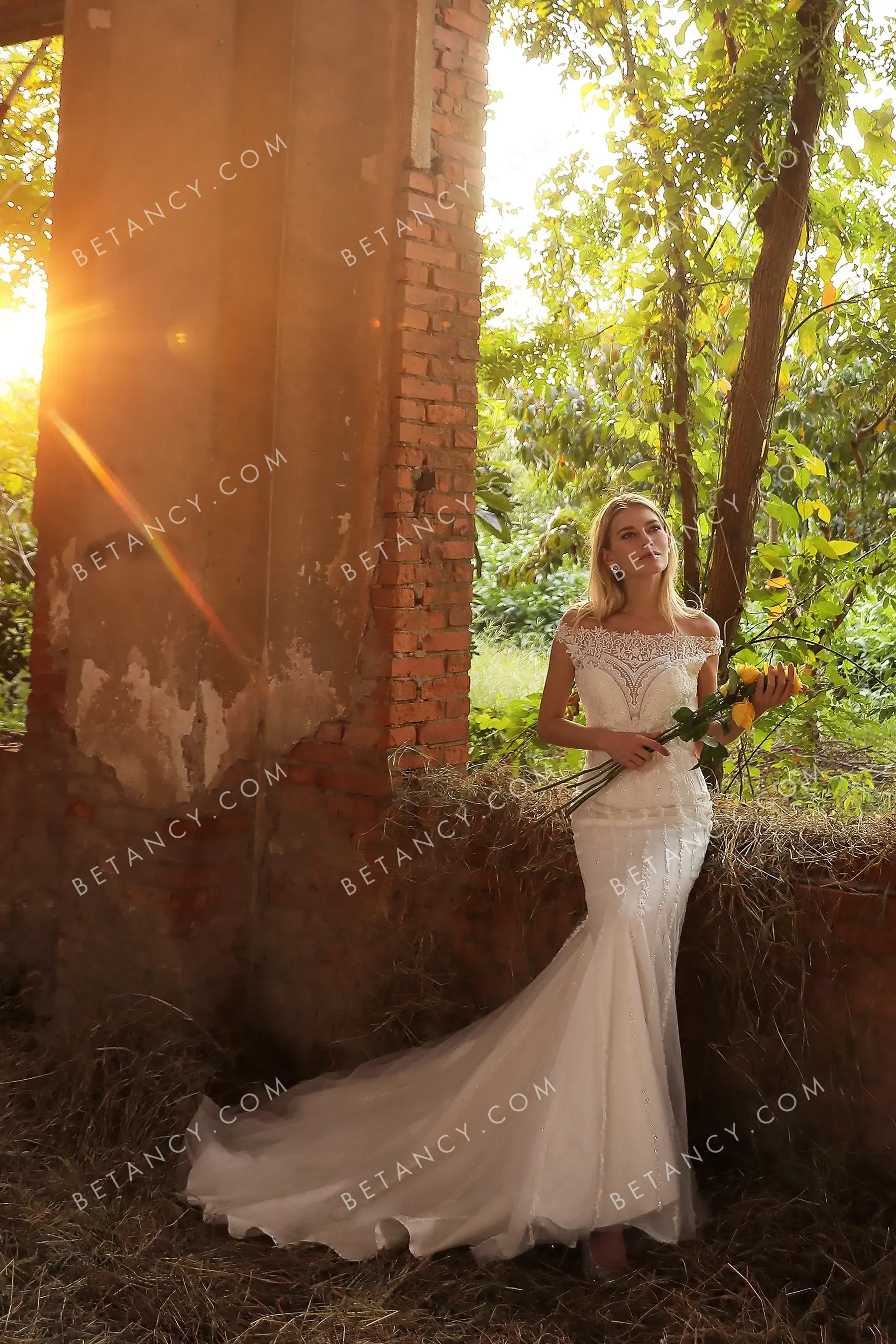 Elegant Off-the-shoulder Beaded Mermaid Bridal Gown