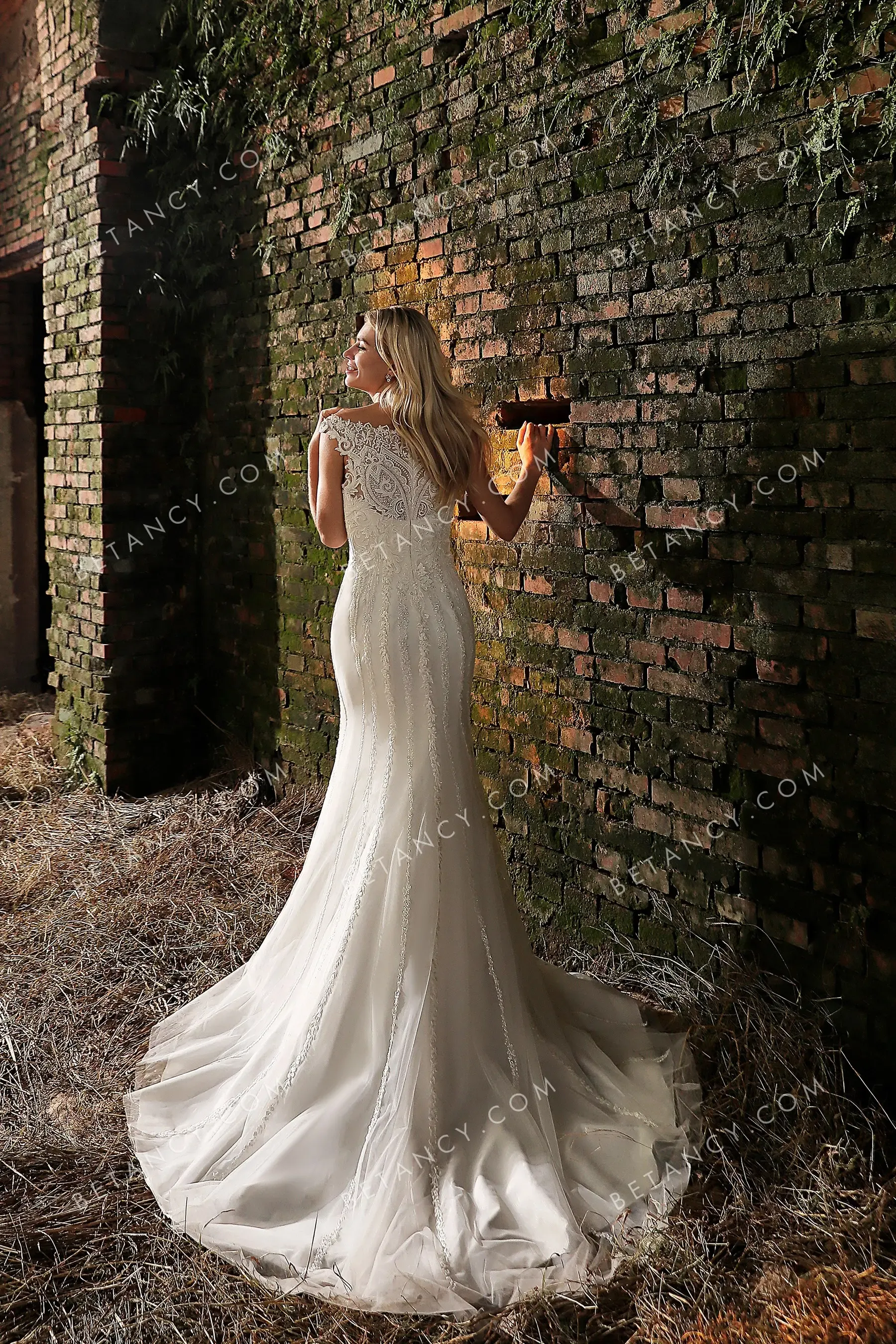 Elegant Off-the-shoulder Beaded Mermaid Bridal Gown