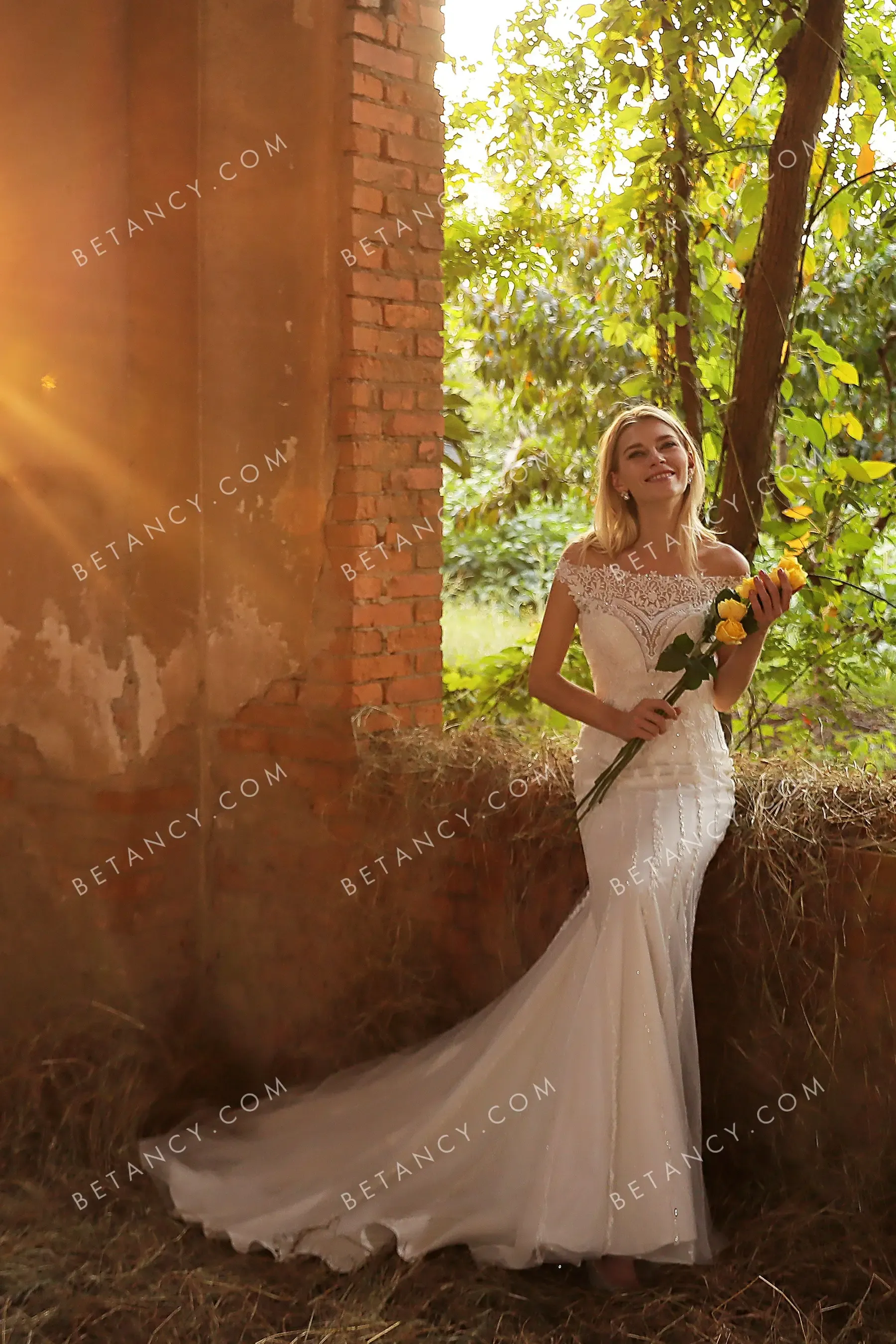 Elegant Off-the-shoulder Beaded Mermaid Bridal Gown